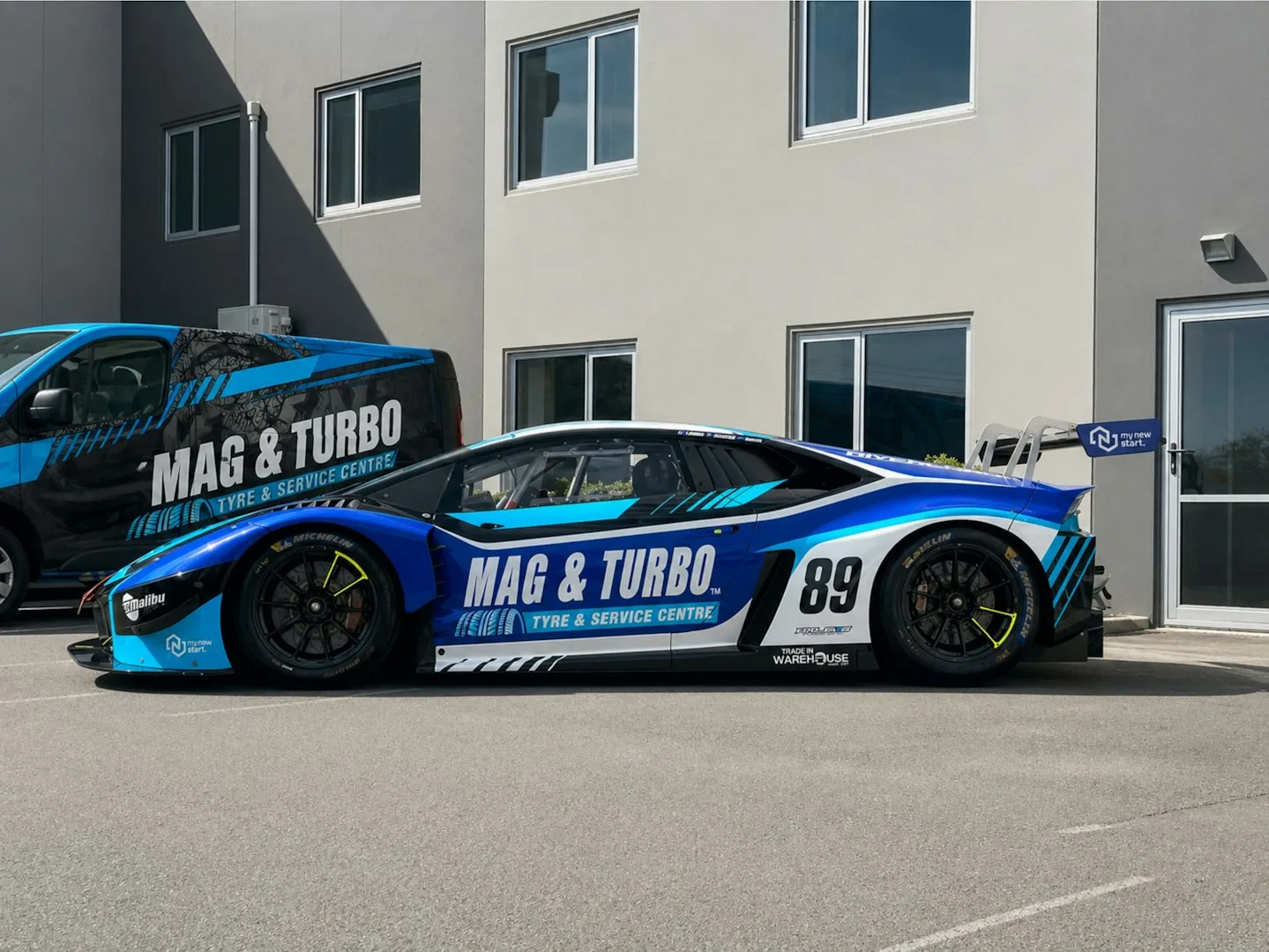Mag & Turbo Lamborghini — the finished car in side profile alongside the branded Mag & Turbo van