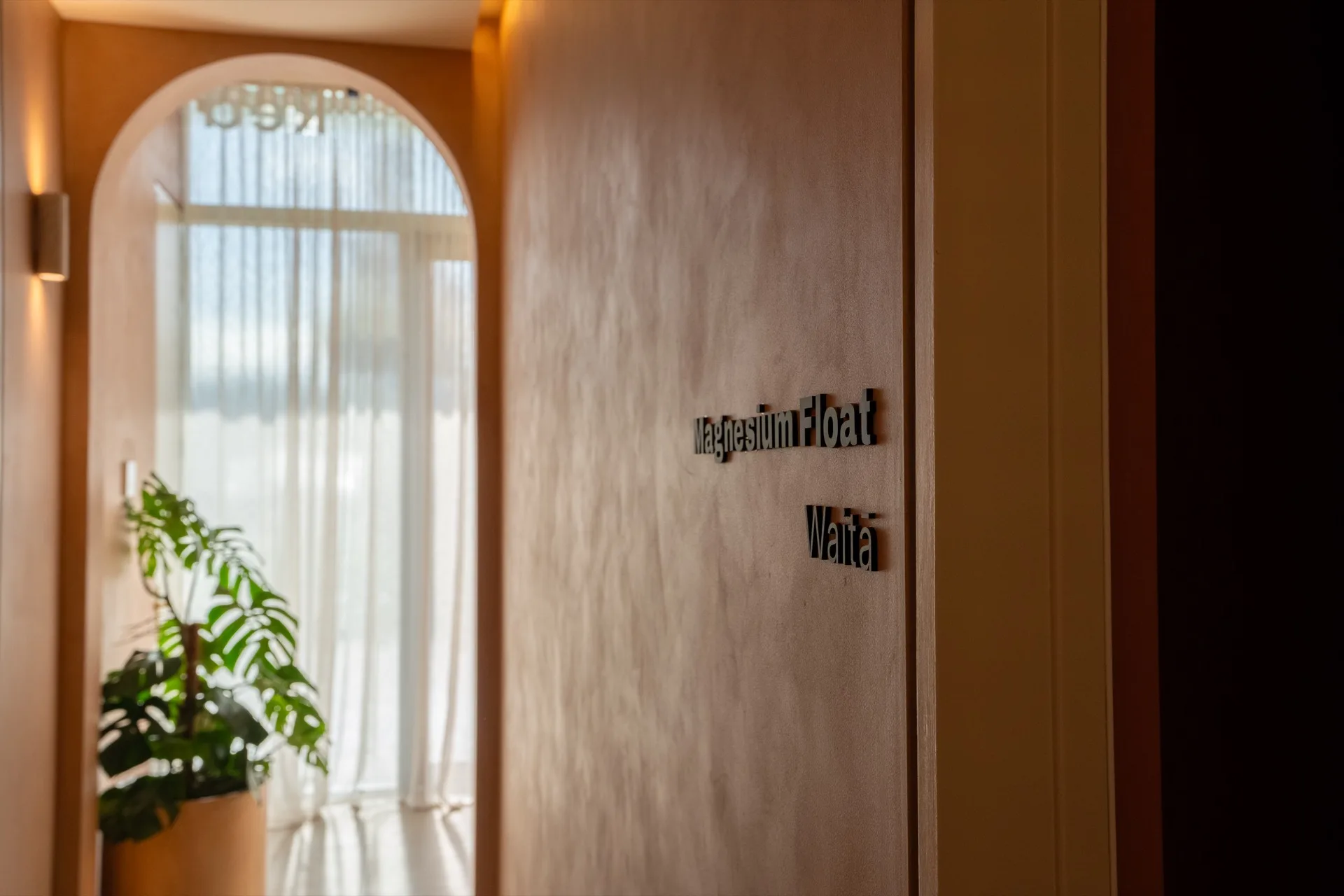 O-Studio — matte black acrylic room lettering, Waita